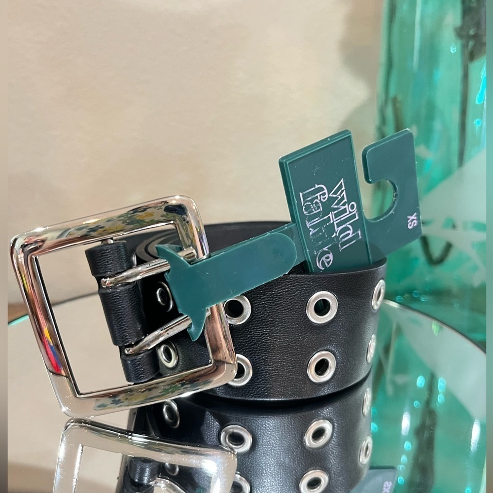 Women’s belt by Wild Fable, black in color with silver  grommets, size XS, new!